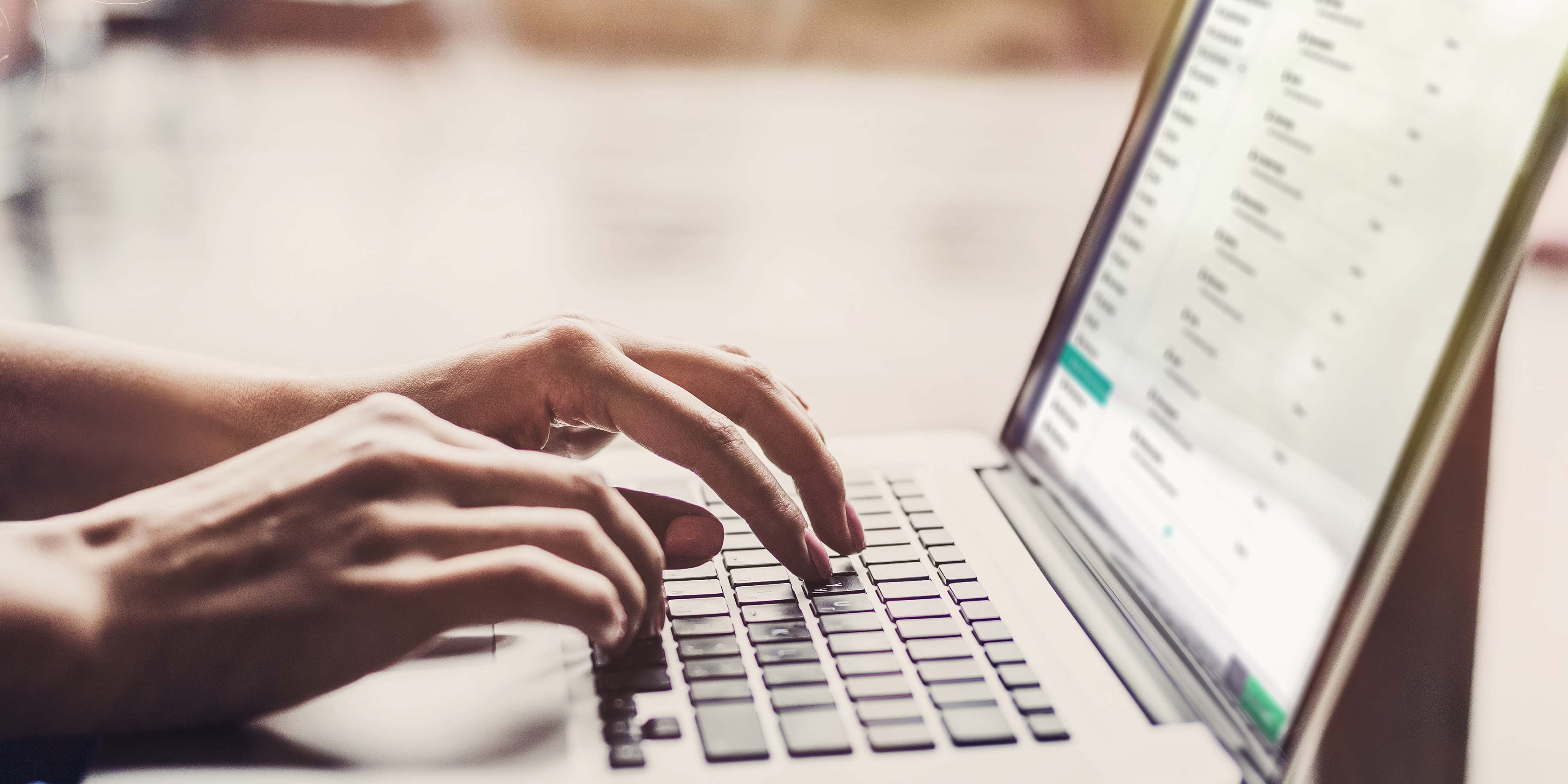 Content editor using Umbraco on a laptop